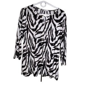 Emily Daniel’s Zebra Printed Long Sleeve Blouse. M